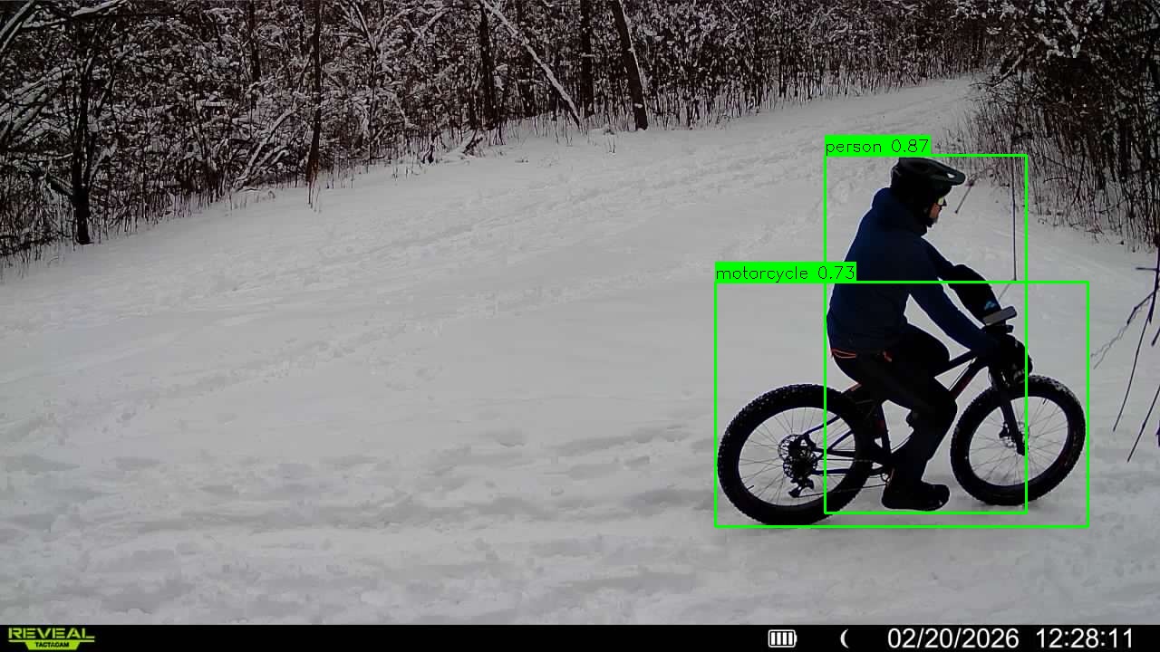 Computer vision detection of cyclist on snowy trail - both person and bicycle are identified and classified